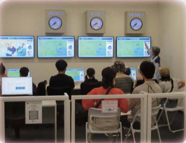 画像：ポンプを運転して、大雨からまちを守るお仕事体験